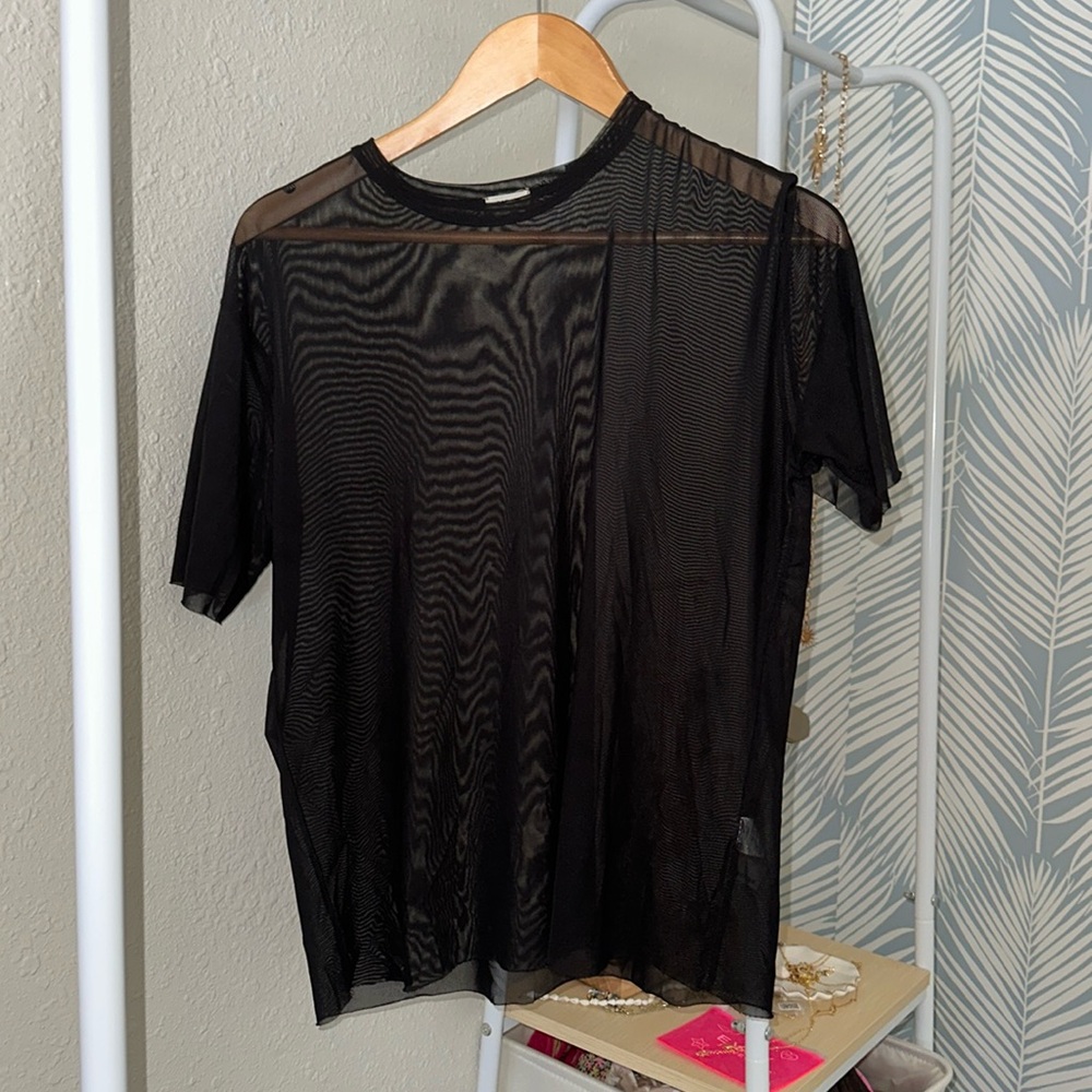 Black going out top